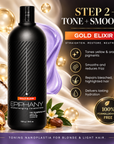 A bottle of Epiphany Gold Elixir Step 2 Tone + Smooth hair conditioner, displayed on a luxurious gold satin background with decorative props like a coconut, almonds, and a purple hair strand. The bottle is black with gold and white text, and the right side features product benefits in a clean graphic layout.